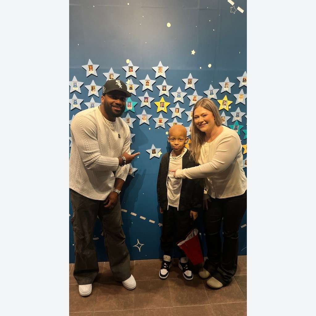 Kyson's parents point to his Wish on the Make-A-Wish